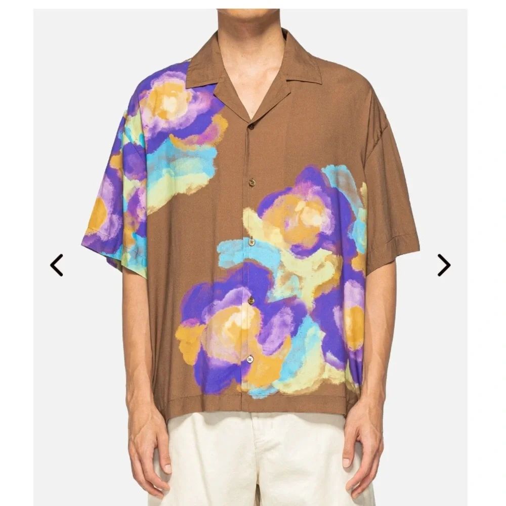 AWAKE NY BOUQUET CAMP SHIRT
RUST FLORAL